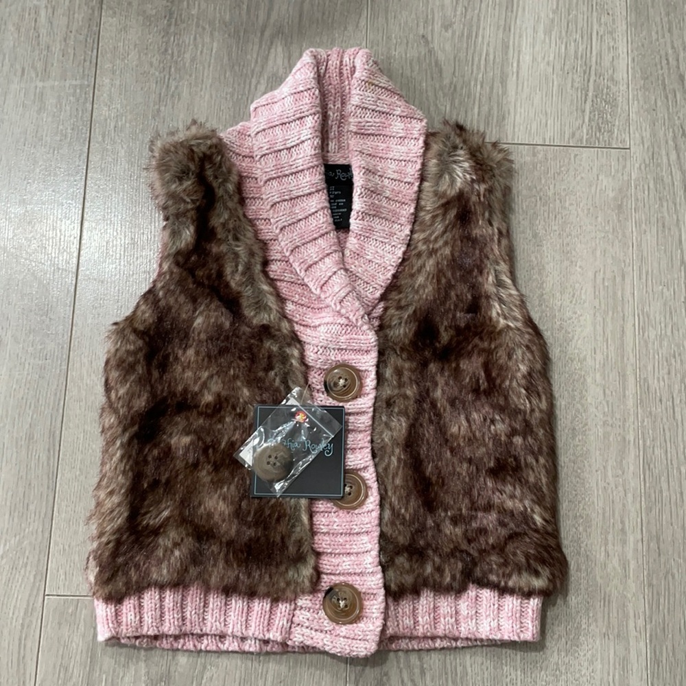 Faux fur vest knit.